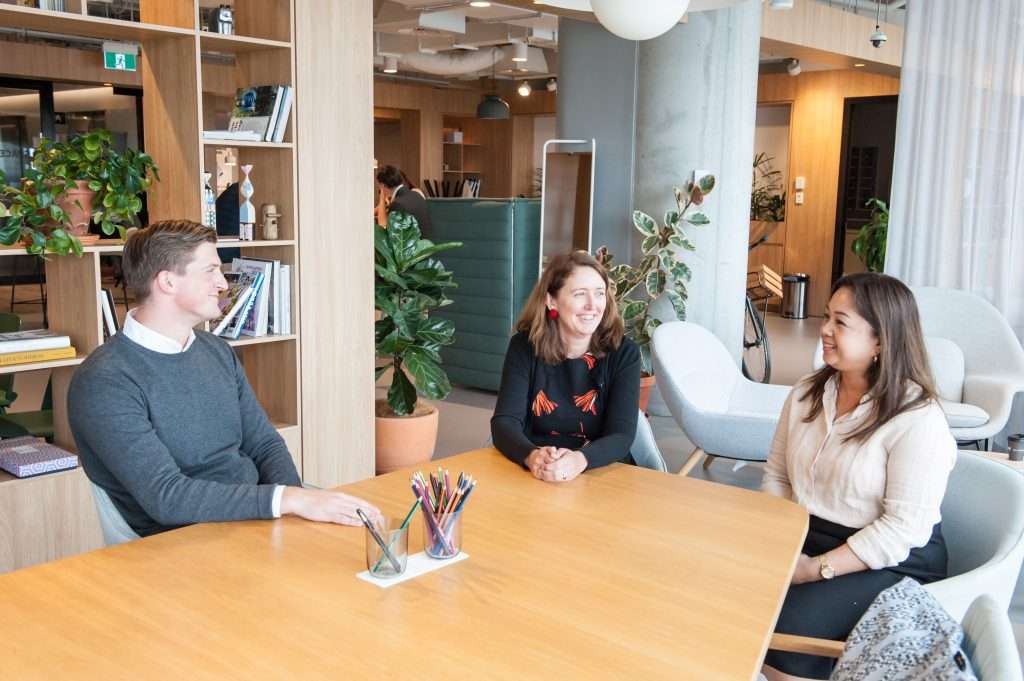 Amplify HR team discussing a culture and innovation project in our Sydney office